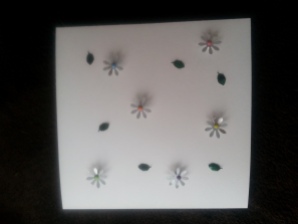 Daisy card made from recycled drinks cans